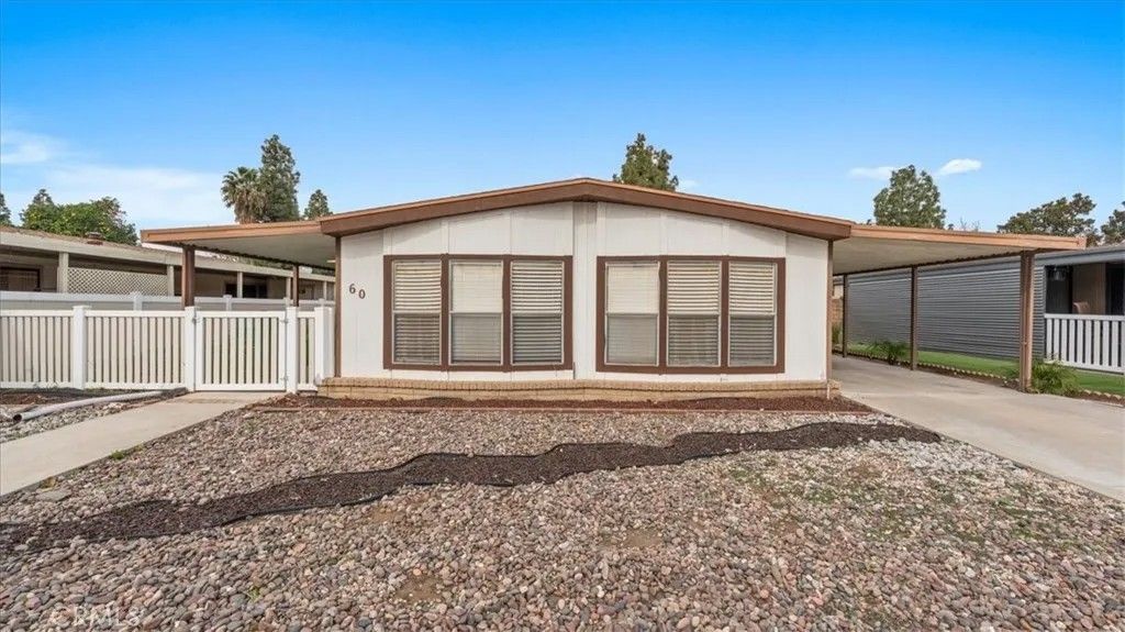 Photo of 13381 Magnolia Ave #60, Corona, CA 92879 (MLS # CV26015512)