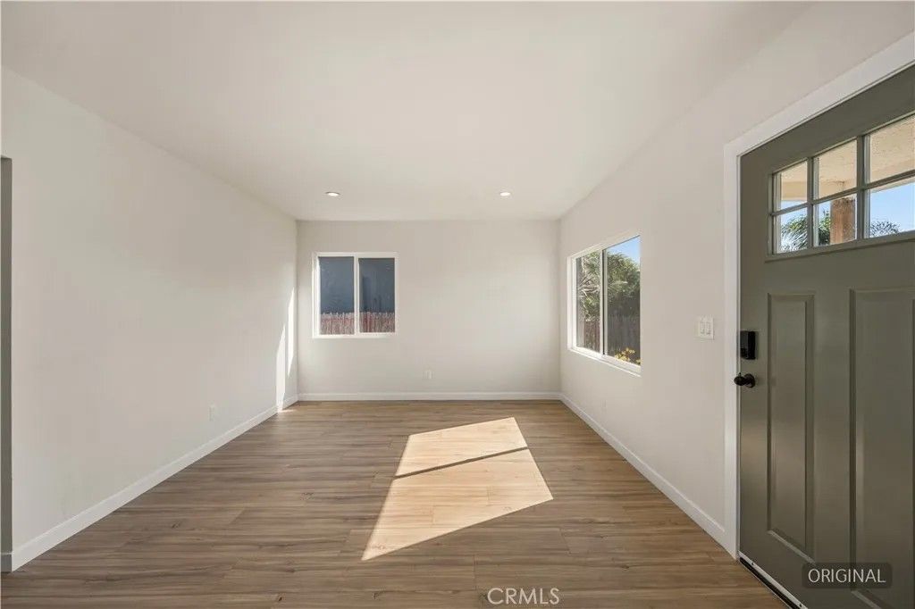 Photo of 1306 S Cliveden Avenue, Compton, CA 90220 (MLS # WS26070838)