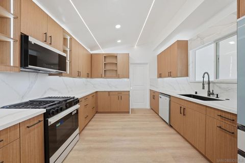 Photo of 2729 Gobat Ave, San Diego, CA 92122 (MLS # 260005280)