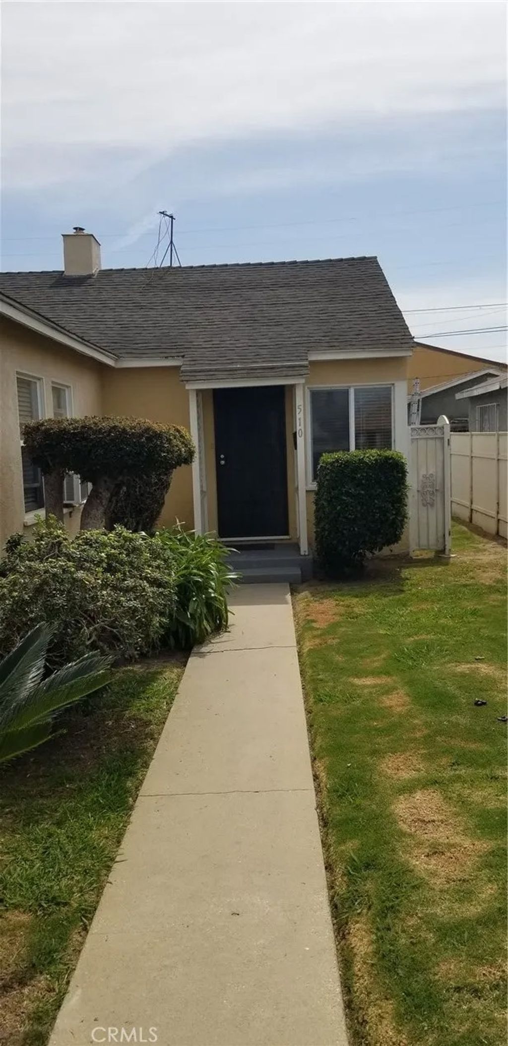 Photo of 508 W Laurel Street, Compton, CA 90220 (MLS # SB26080777)