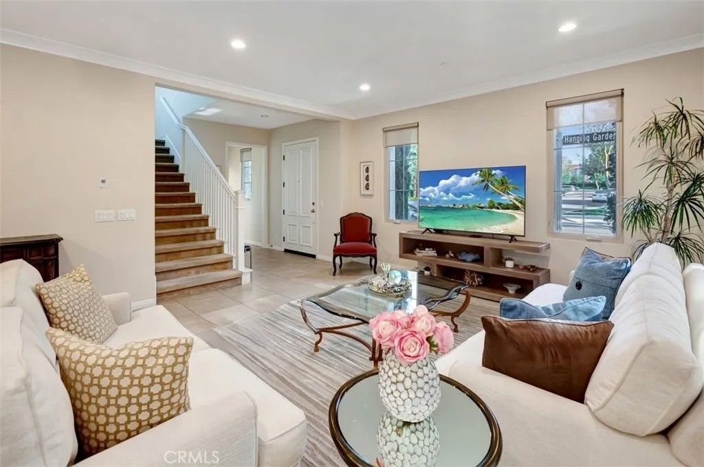 Photo of 67 Hanging Garden, Irvine, CA 92620 (MLS # OC26025977)