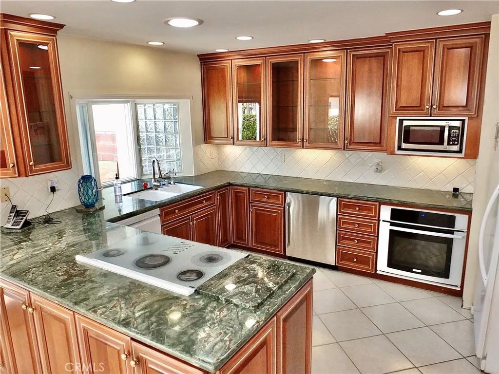 Photo of 148 E 36th Street, Long Beach, CA 90807 (MLS # PW26078604)