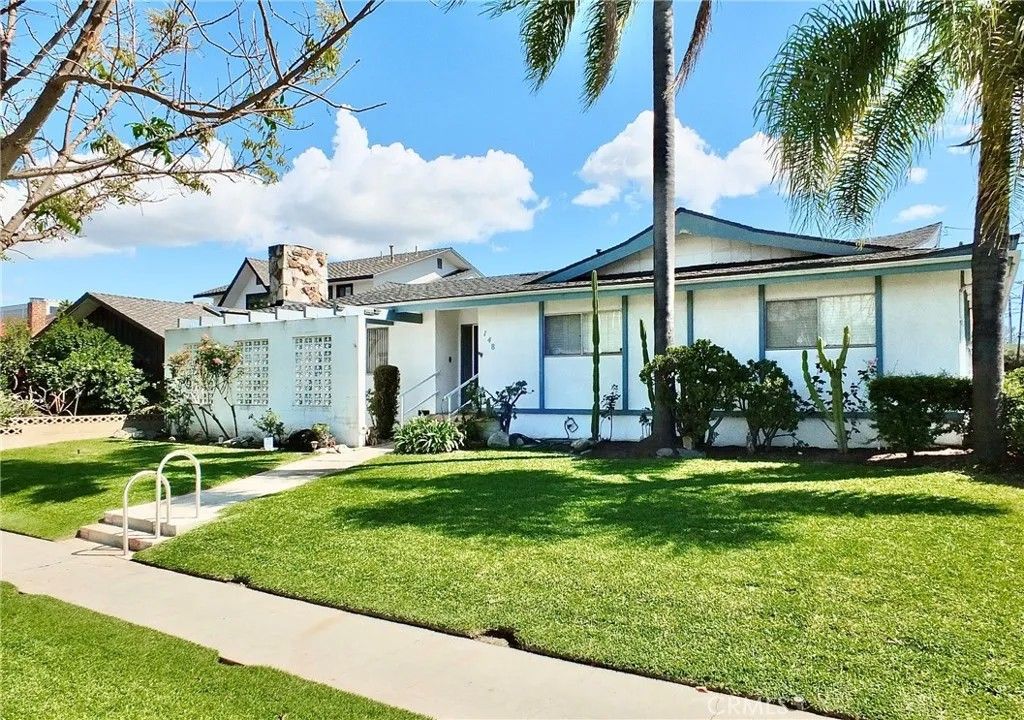 Photo of 148 E 36th Street, Long Beach, CA 90807 (MLS # PW26078604)