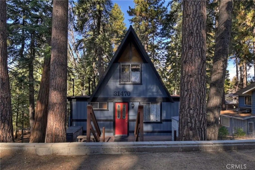 Photo of 31470 Cedarwood Drive, Running Springs, CA 92382 (MLS # IG25277626)