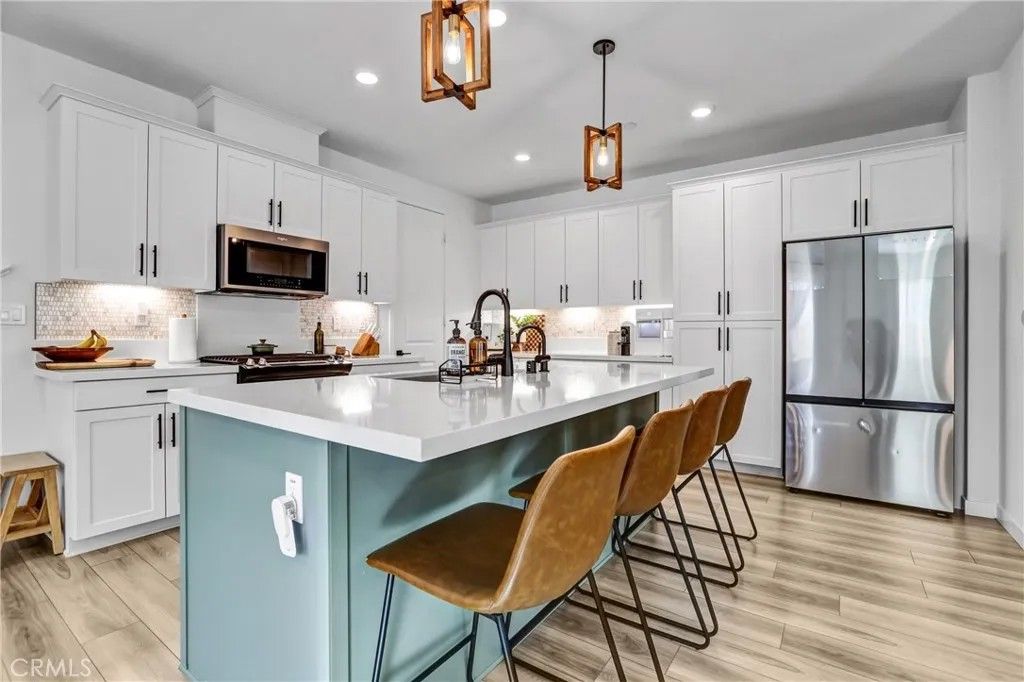 Photo of 27660 Ensemble Place, Valencia, CA 91381 (MLS # TR26012014)