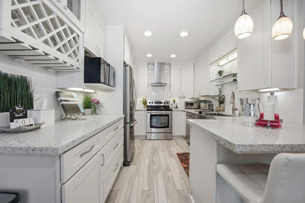 Photo of 10300 Caminito Cuervo #52, San Diego, CA 92108 (MLS # 260008192)