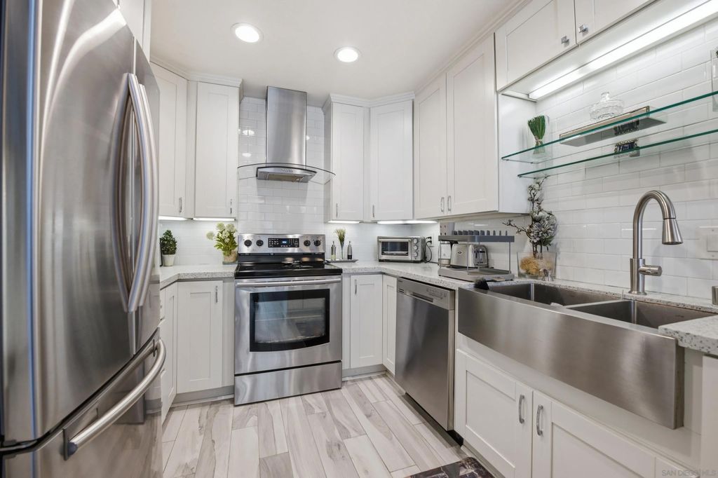 Photo of 10300 Caminito Cuervo #52, San Diego, CA 92108 (MLS # 260008192)