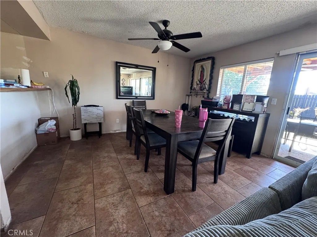 Photo of 23575 Whispering Winds Way, Moreno Valley, CA 92557 (MLS # SW26032031)