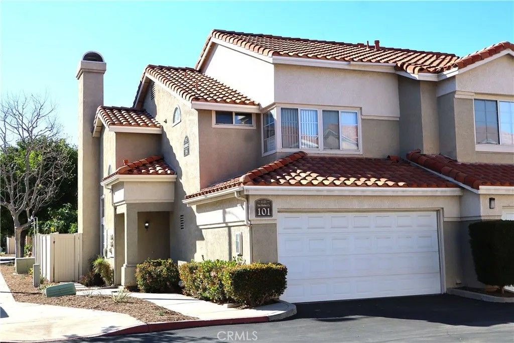 Photo of 1121 San Marino Court #101, Corona, CA 92881 (MLS # SW25165785)