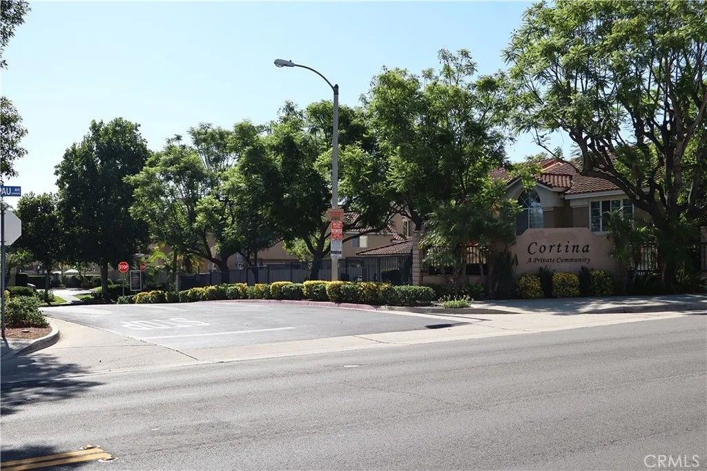 Photo of 1121 San Marino Court #101, Corona, CA 92881 (MLS # SW25165785)