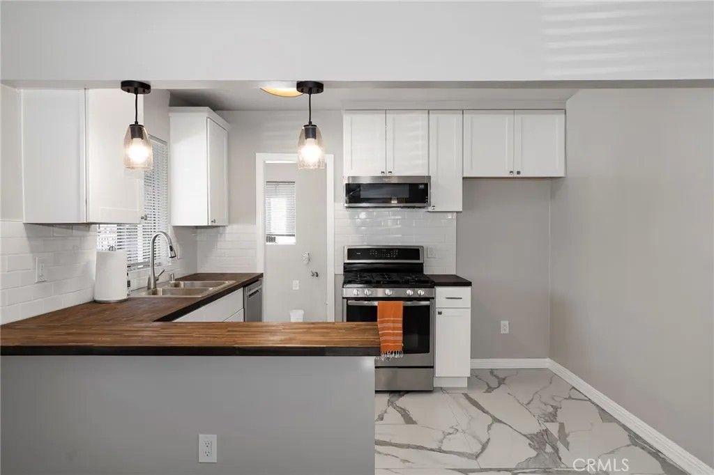 Photo of 2241 Pine Ave, Long Beach, CA 90806 (MLS # PW26069443)