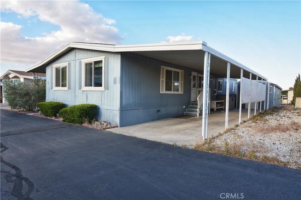 Photo of 14000 El Evado Rd #78, Victorville, CA 92392 (MLS # HD26092185)
