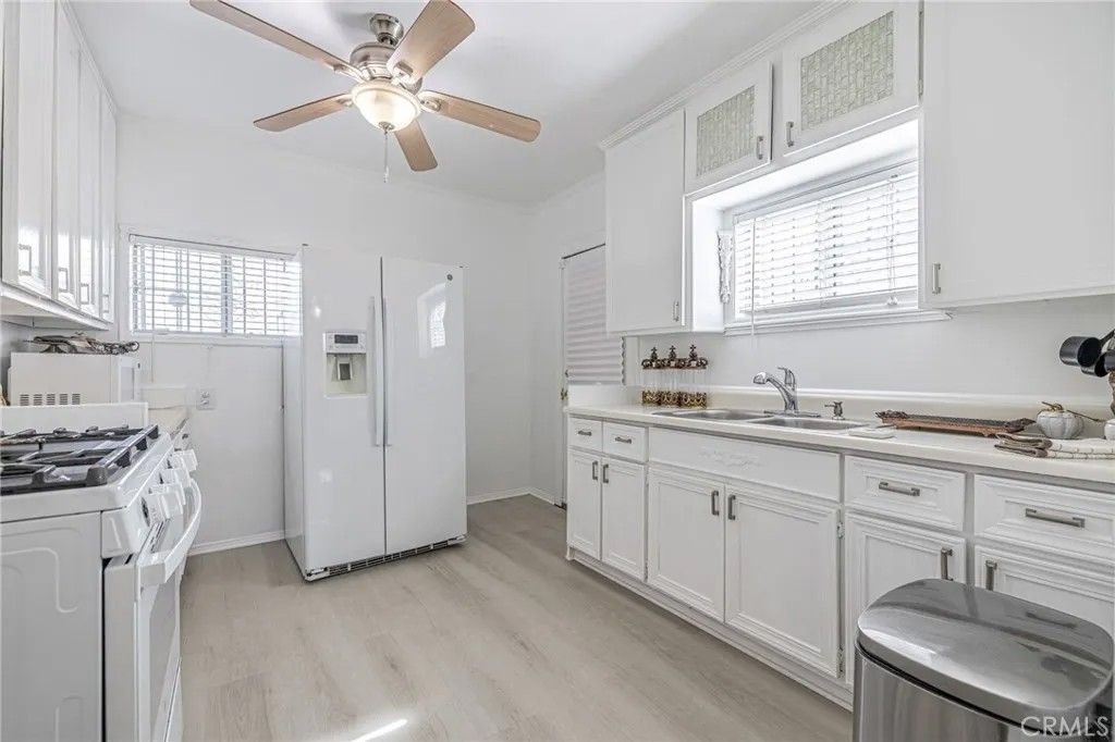 Photo of 1000 N Mayo Ave, Compton, CA 90221 (MLS # SR26025515)