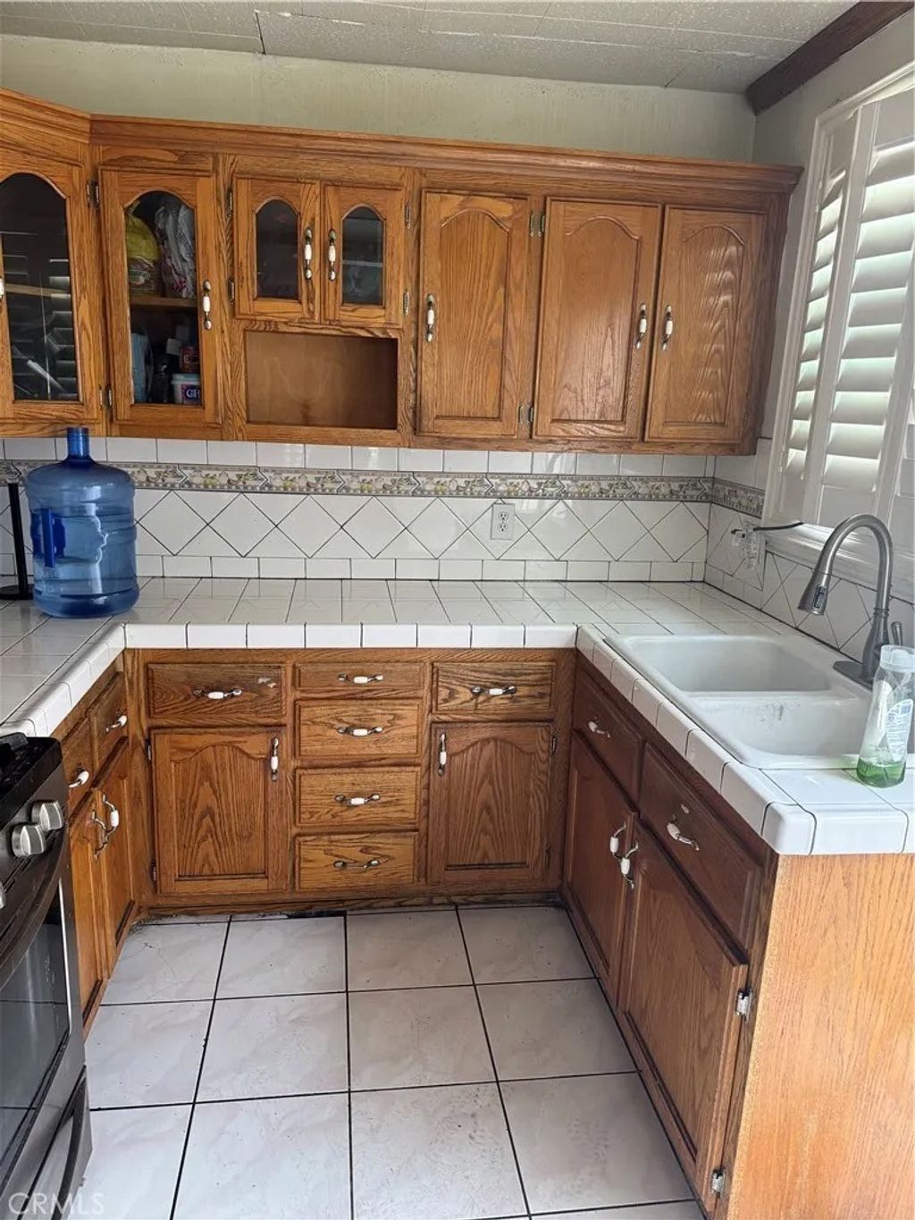 Photo of 10439 Stanford Avenue, South Gate, CA 90280 (MLS # HD26032408)