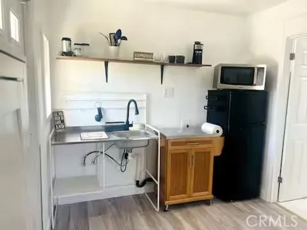 Photo of 665 N. San Antonio Ave, Upland, CA 91786 (MLS # SB25278289)