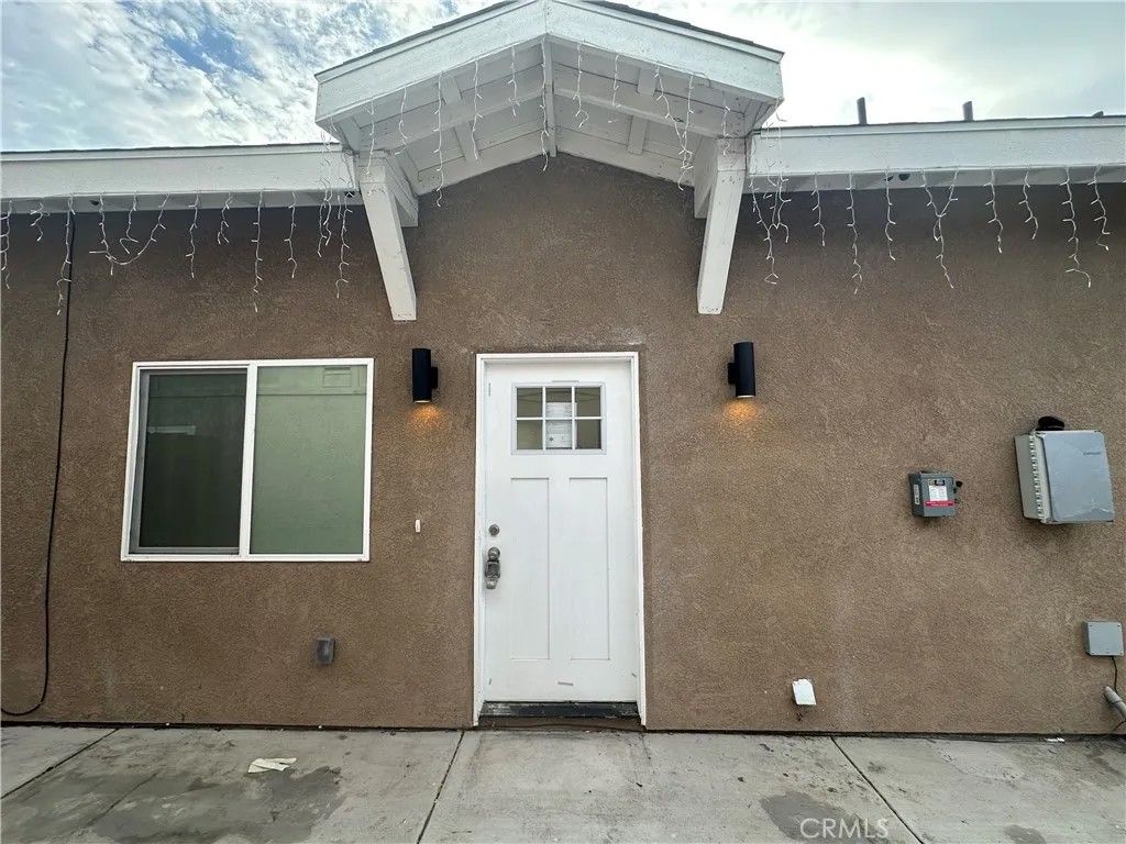 Photo of 10893 Date St, Stanton, CA 90680 (MLS # PW26088815)