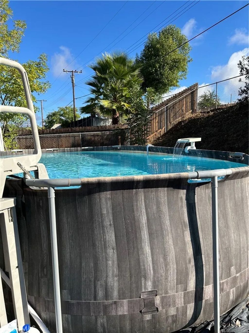Photo of 27806 Meadowcreek Rd, Canyon Country, CA 91351 (MLS # SR25241417)