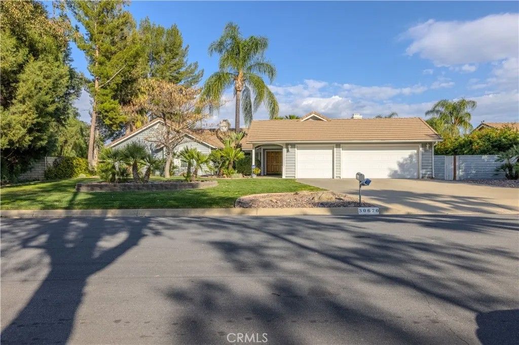 Photo of 30670 Brookstone Ln, Lake Elsinore, CA 92530 (MLS # SW26052920)