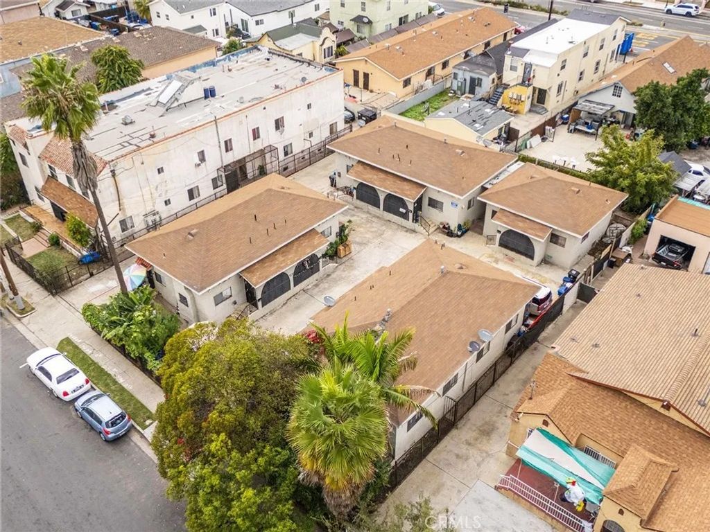 Photo of 917 E 40th Pl, Los Angeles, CA 90011 (MLS # OC25262442)