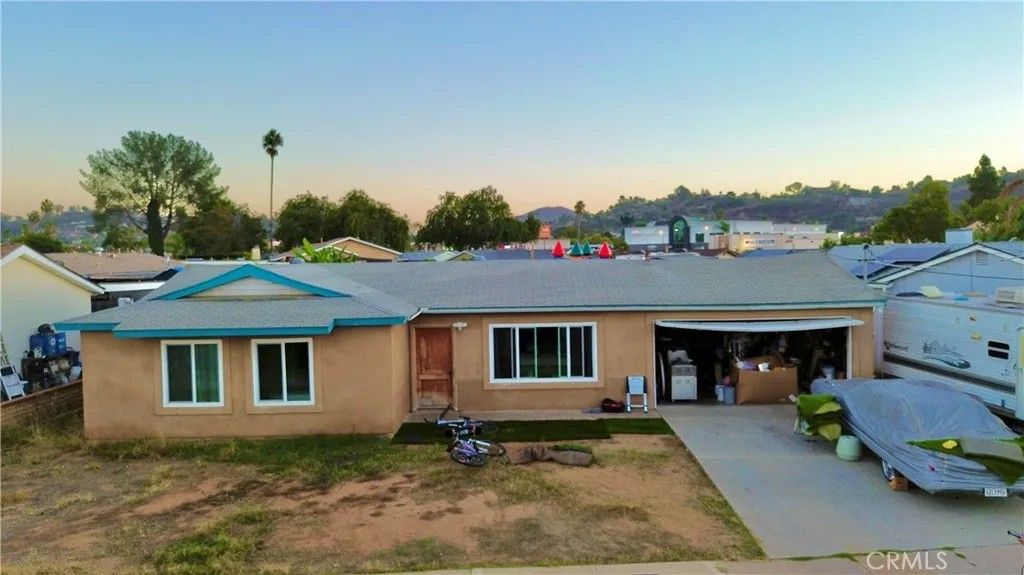 Photo of 1417 Sunnyland Ave, El Cajon, CA 92019 (MLS # OC25244580)