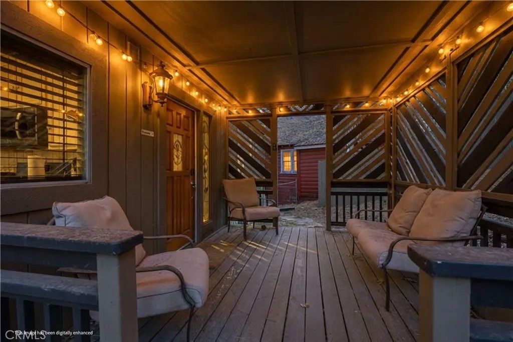 Photo of 875 Sierra Vista Drive, Twin Peaks, CA 92391 (MLS # IG26047411)