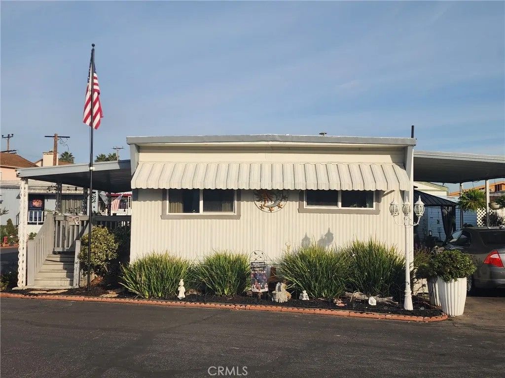 Photo of 24815 Normandie Ave #75, Harbor City, CA 90710 (MLS # SB26017766)