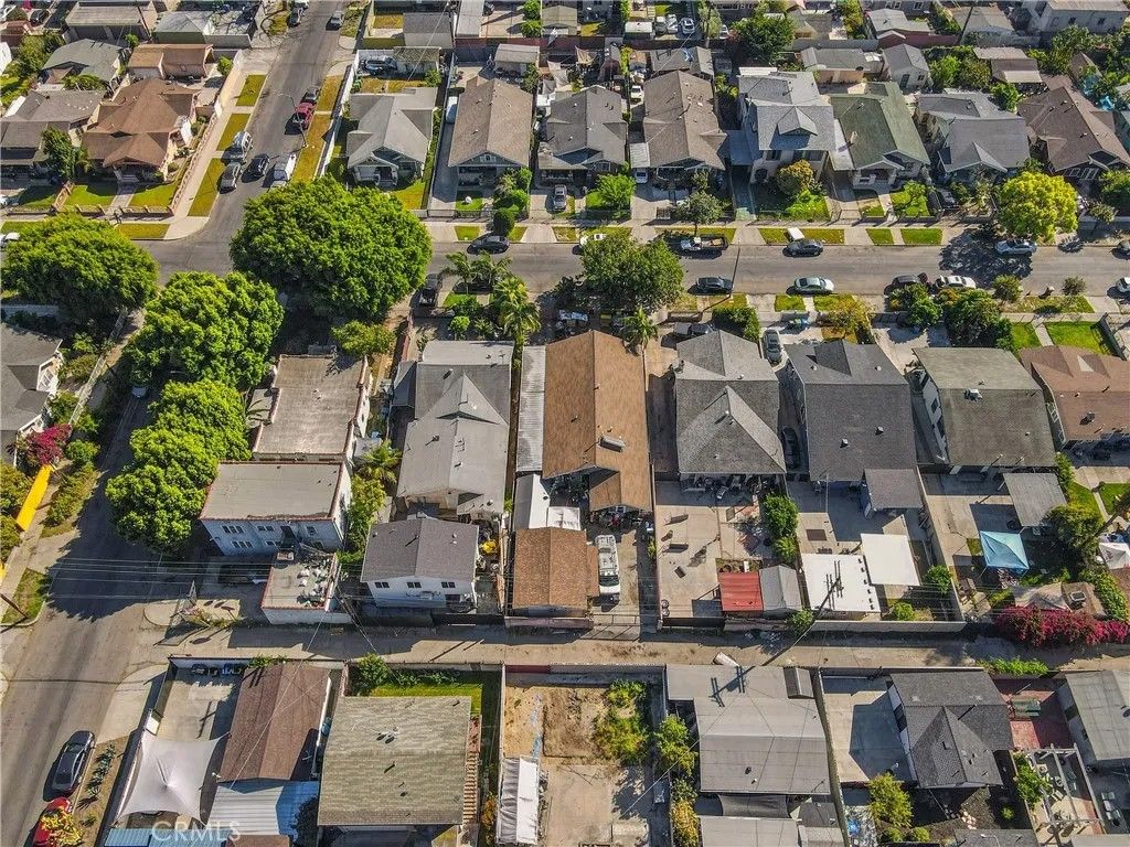 Photo of 1611 46th Ave, Los Angeles, CA 90062 (MLS # SB26005267)