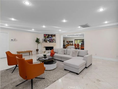 Photo of 11131 Mac Murray Street, Garden Grove, CA 92841 (MLS # PW26049350)