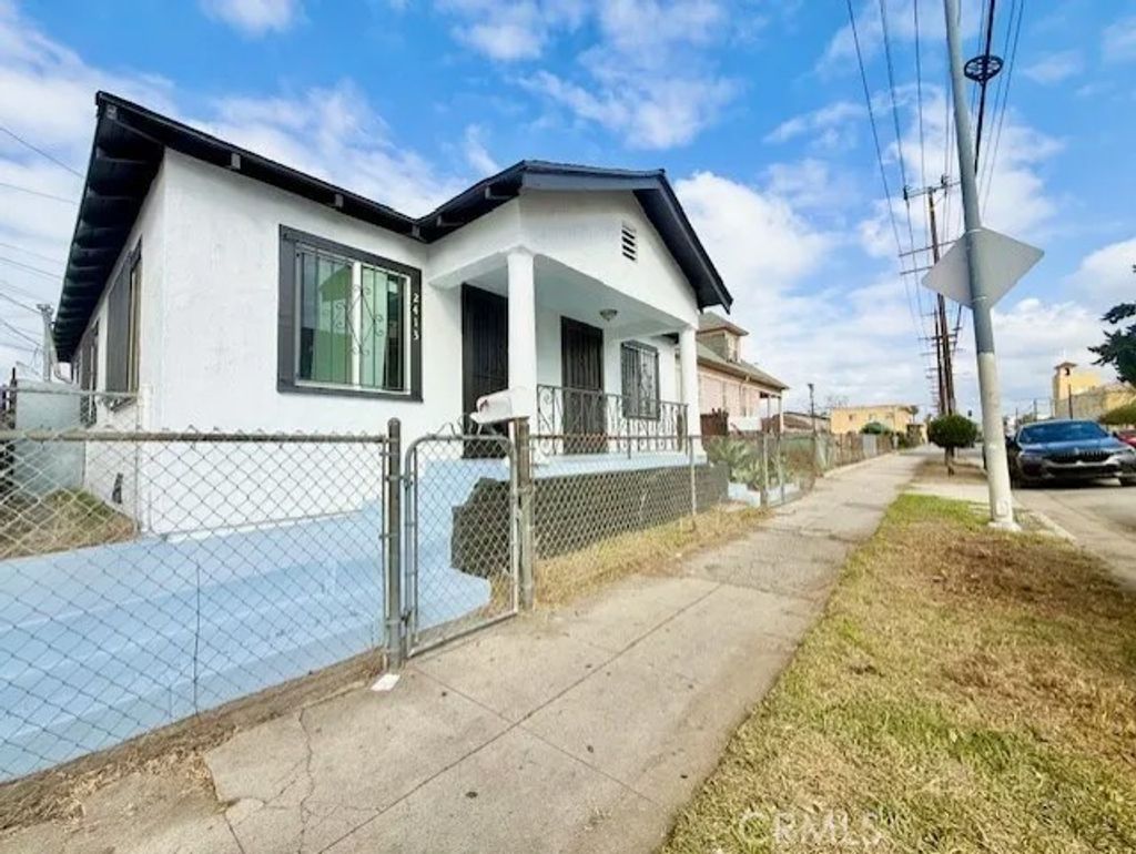 Photo of 2411 Griffith Avenue, Los Angeles, CA 90011 (MLS # MB26008636)