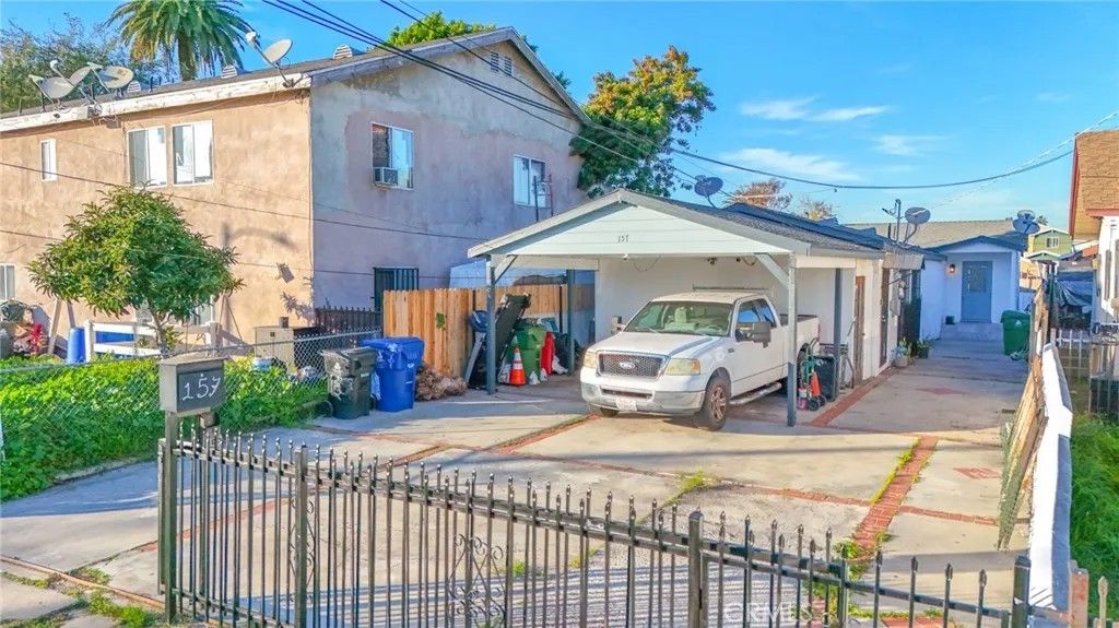 Photo of 155 W 103 Street, Los Angeles, CA 90003 (MLS # DW26009037)