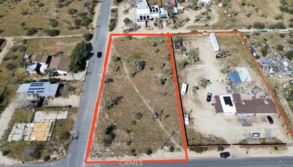 Photo of 7199 Grand Ave, Yucca Valley, CA 92284 (MLS # IV26160661)