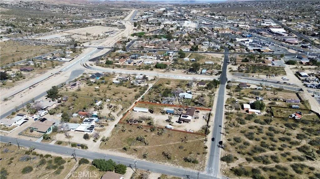 Photo of 7199 Grand Ave, Yucca Valley, CA 92284 (MLS # IV26160661)
