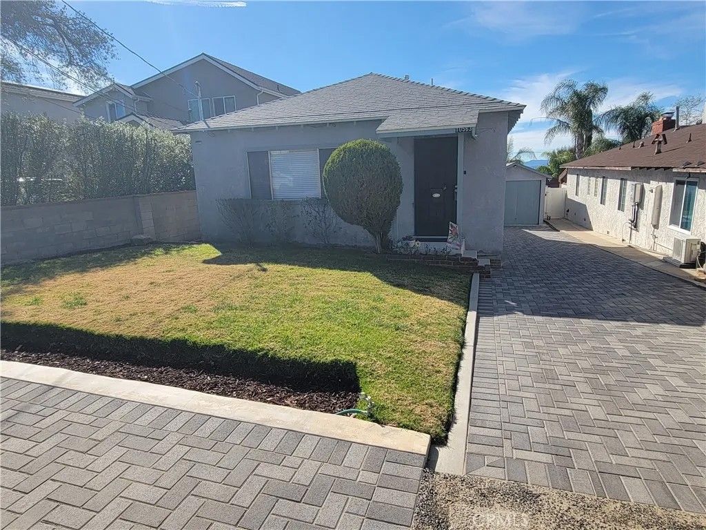 Photo of 10563 Las Lunitas Ave, Tujunga, CA 91042 (MLS # IV26066085)