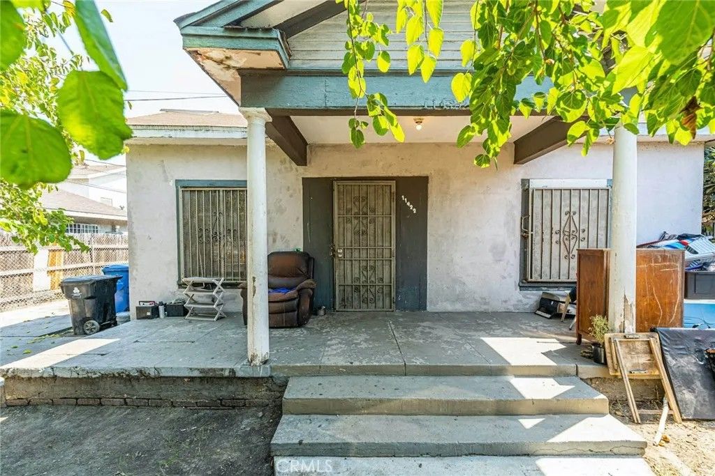 Photo of 11422 Willowbrook Ave, Los Angeles, CA 90059 (MLS # PW26081818)