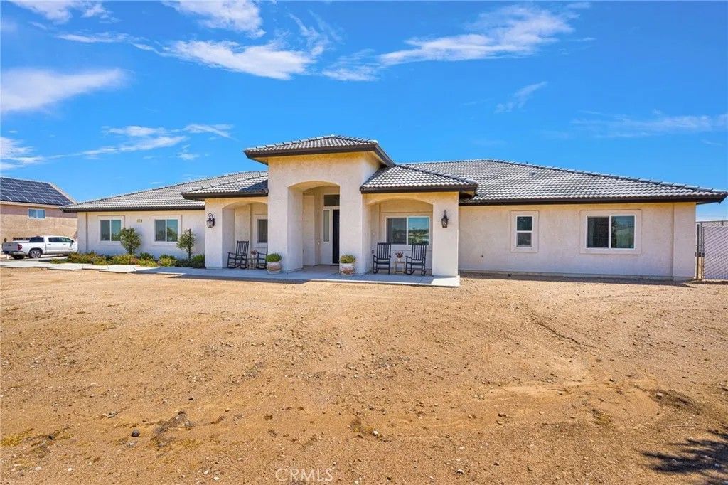 Photo of 8421 Macron St, Oak Hills, CA 92344 (MLS # HD26084528)
