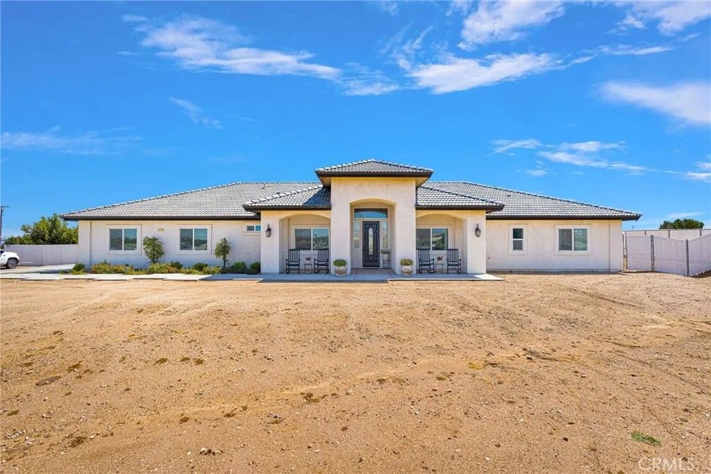 Photo of 8421 Macron St, Oak Hills, CA 92344 (MLS # HD26084528)