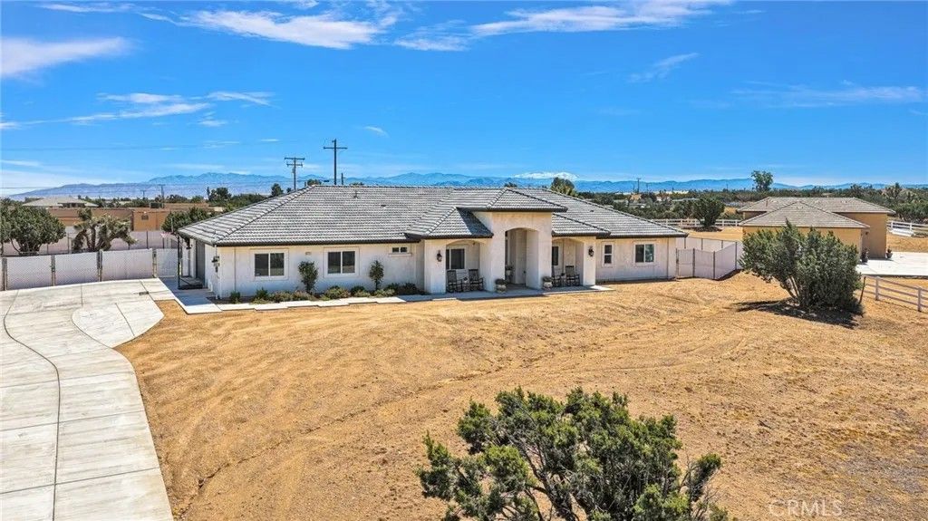 Photo of 8421 Macron St, Oak Hills, CA 92344 (MLS # HD26084528)