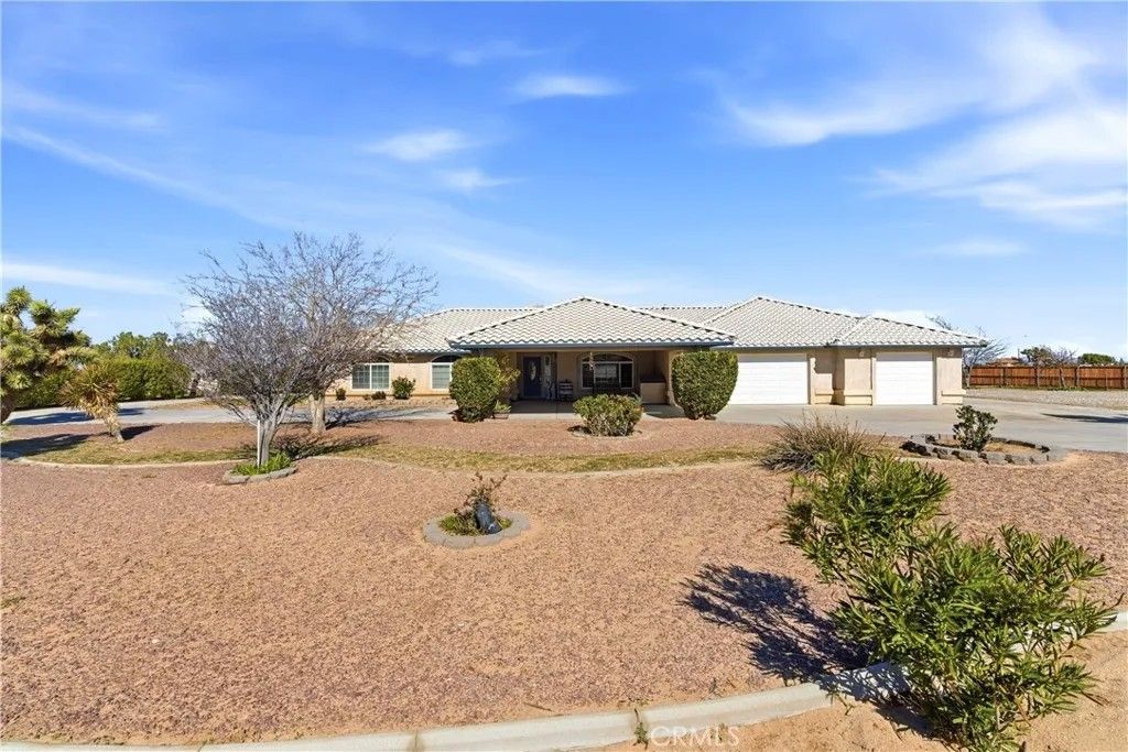 Photo of 7330 Smoke Tree Rd, Phelan, CA 92371 (MLS # CV26037431)