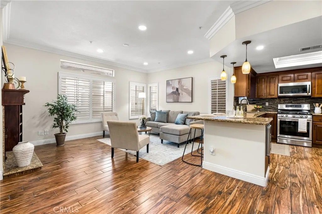 Photo of 4561 Warner Ave #203, Huntington Beach, CA 92649 (MLS # OC26041365)