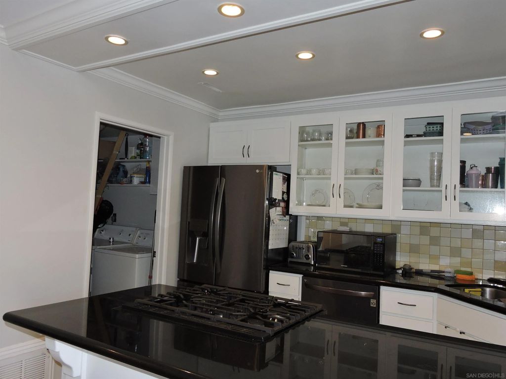 Photo of 5230 Mount Alifan Dr, San Diego, CA 92111 (MLS # 250040891)