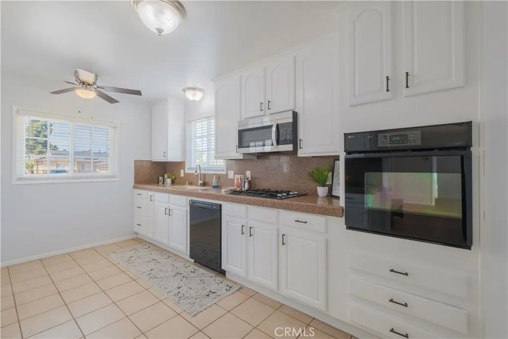 Photo of 11648 Harvard Dr, Norwalk, CA 90650 (MLS # DW26052564)