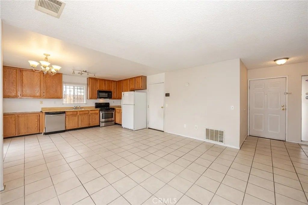 Photo of 10415 Buckboard Circle, Adelanto, CA 92301 (MLS # CV26093215)
