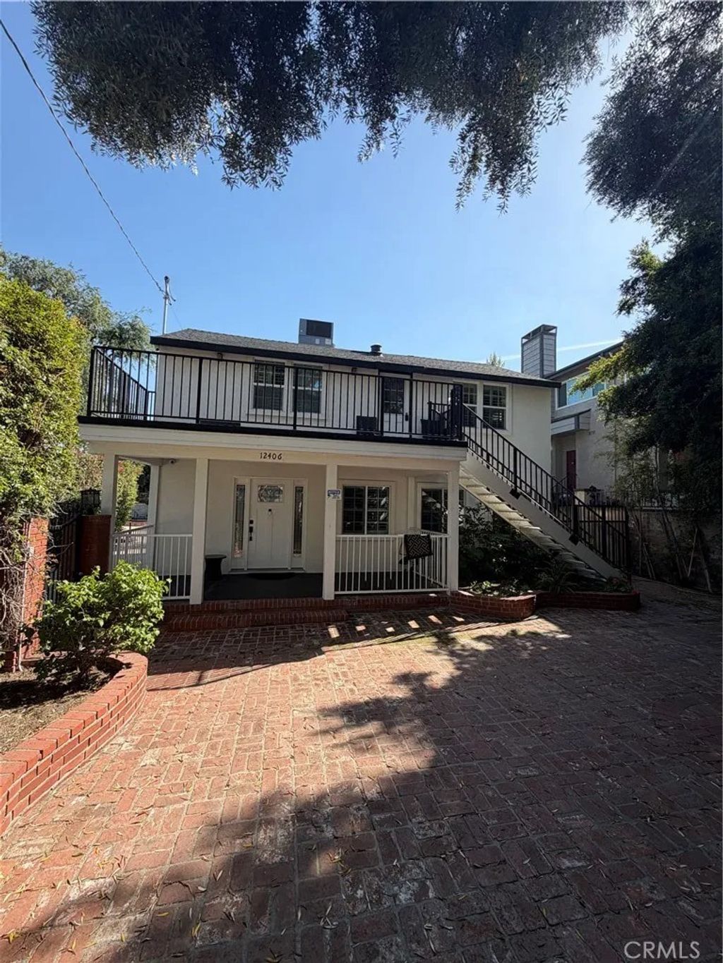 Photo of 12406 Magnolia Blvd, Valley Village, CA 91607 (MLS # SR26074093)