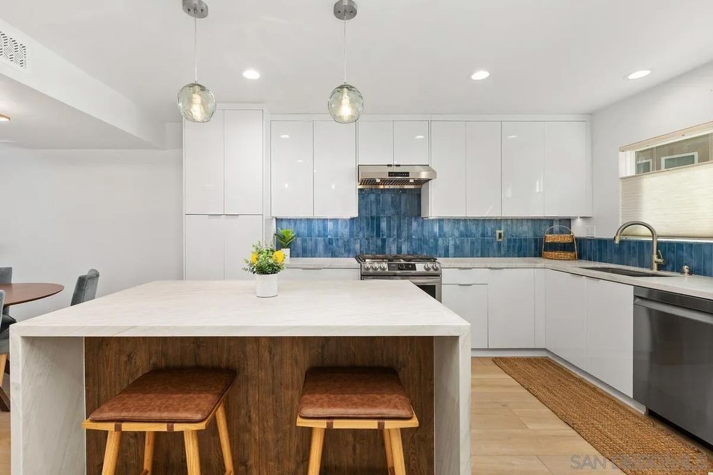 Photo of 401 N Coast Hwy #303, Oceanside, CA 92054 (MLS # 2600774)