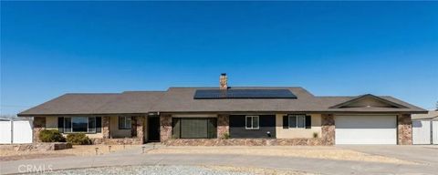 Photo of 14010 Jicarilla Rd, Apple Valley, CA 92307 (MLS # IV26006220)