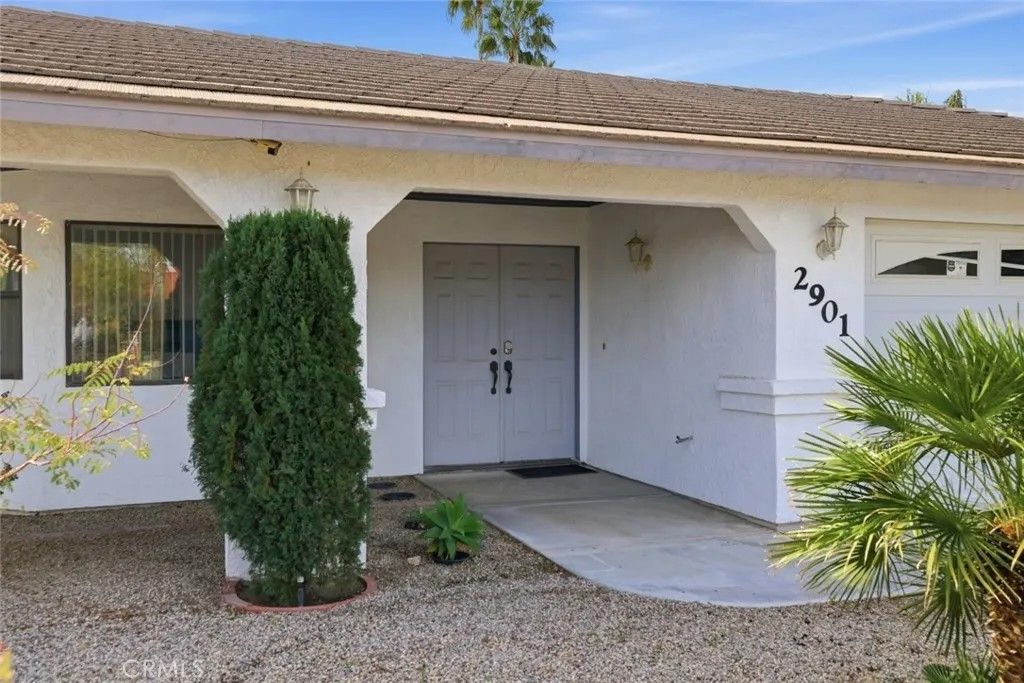 Photo of 2901 E Via Escuela, Palm Springs, CA 92262 (MLS # GD26041962)