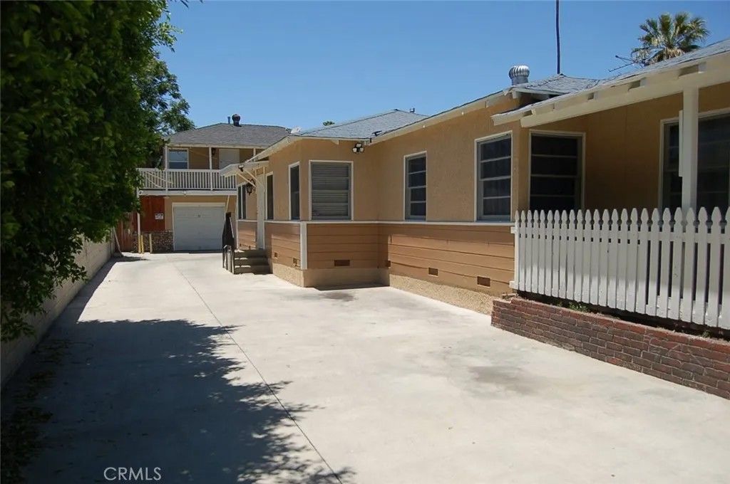 Photo of 667 N Towne Avenue, Pomona, CA 91767 (MLS # TR26018484)