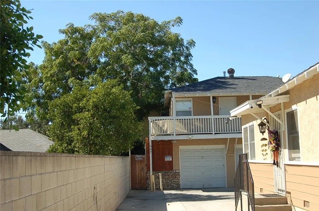 Photo of 667 N Towne Avenue, Pomona, CA 91767 (MLS # TR26018484)