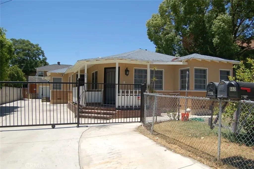 Photo of 667 N Towne Avenue, Pomona, CA 91767 (MLS # TR26018484)