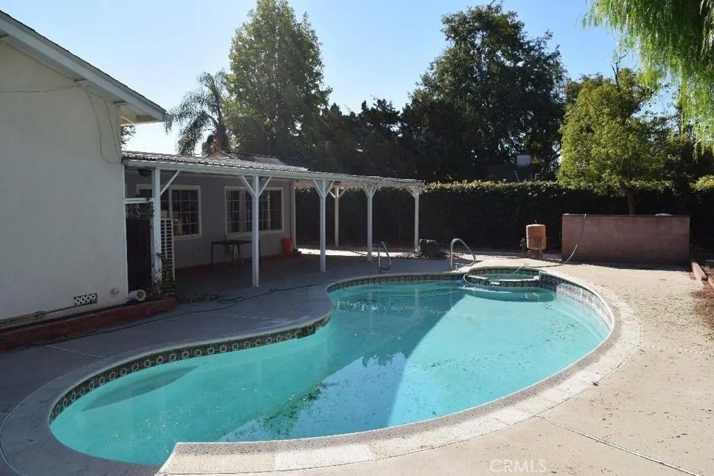 Photo of 8443 Remmet, Canoga Park, CA 91304 (MLS # GD25263222)